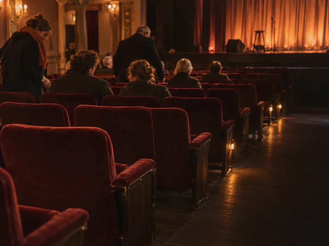 Empty red seats in a theatre auditorium before the show